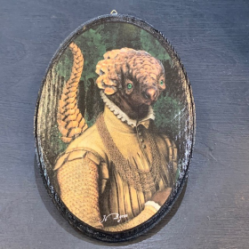 Anthropomorphic oval wooden Medallion by John Byron