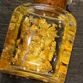 Bottle of 22 carat gold