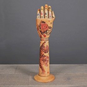 Articulated wooden tattoo...