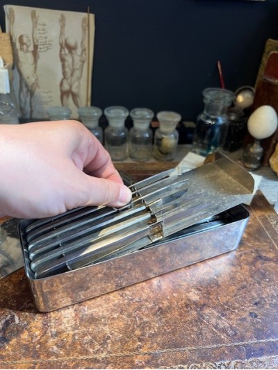 Antique box of scalpels -...