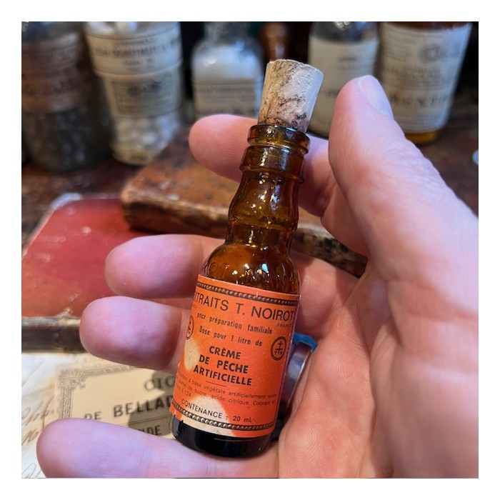 Extrait NOIROT - Crème Pêche artificielle - Flacon ancien de pharmacie