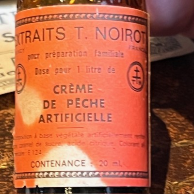 Extrait NOIROT - Crème Pêche artificielle - Flacon ancien de pharmacie