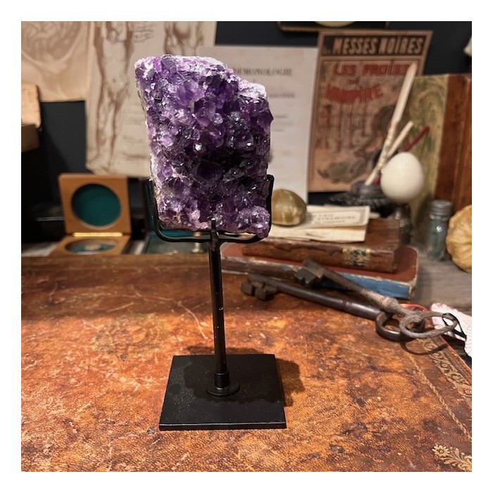 Amethyst fragment on a stand