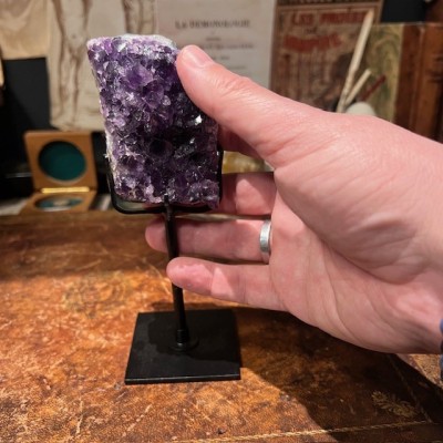 Amethyst fragment on a stand
