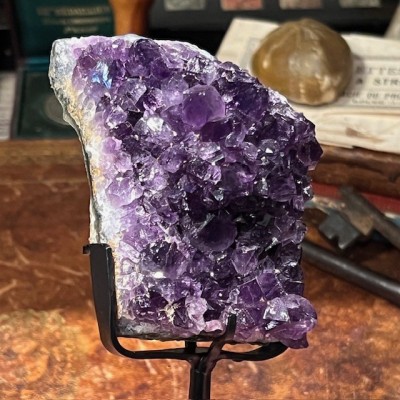 Amethyst fragment on a stand