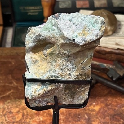 Amethyst fragment on a stand