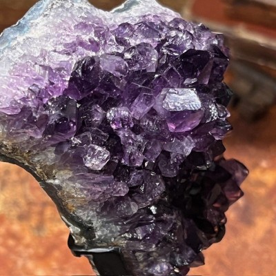 Amethyst fragment on a stand
