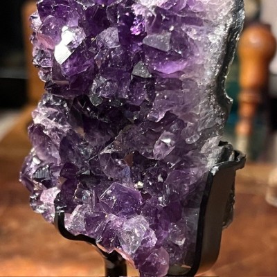 Amethyst fragment on a stand