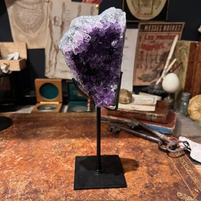 Amethyst fragment on a stand