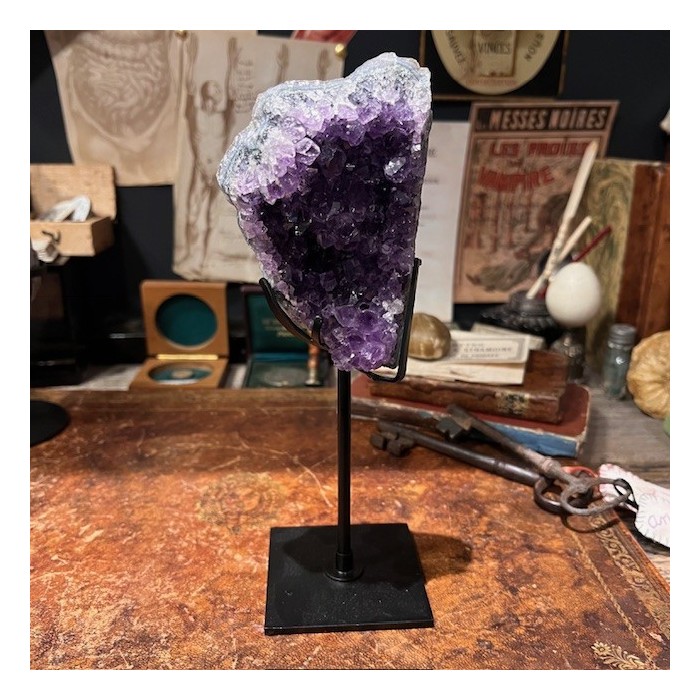 Amethyst fragment on a stand