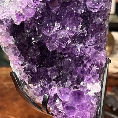 Amethyst fragment on a stand