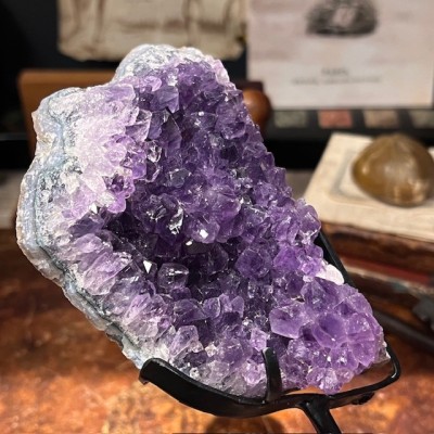 Amethyst fragment on a stand