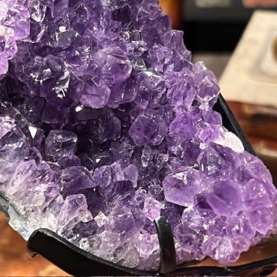 Amethyst fragment on a stand