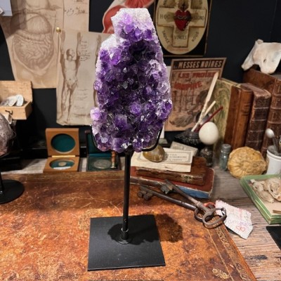 Amethyst fragment on a stand
