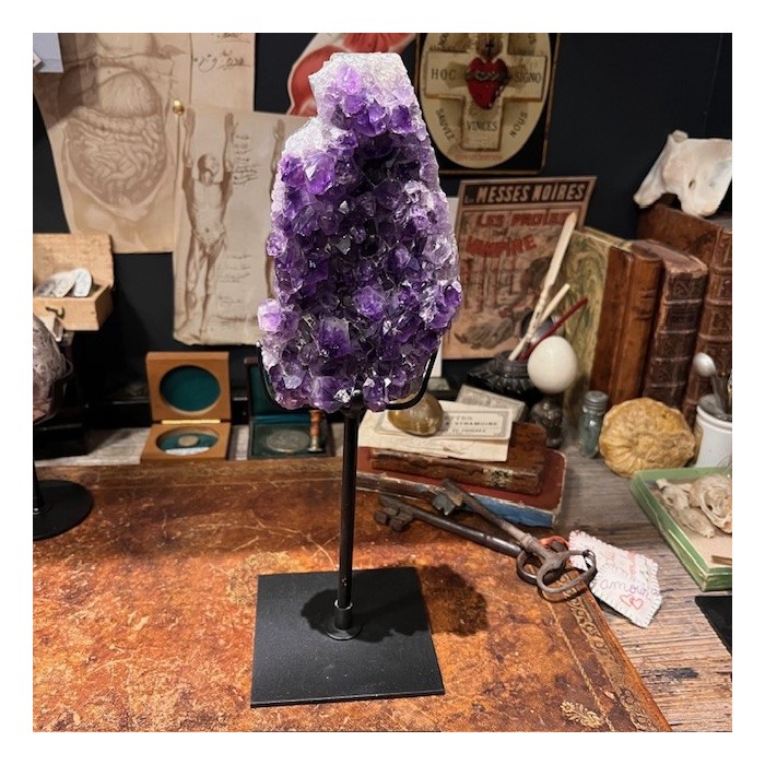Amethyst fragment on a stand