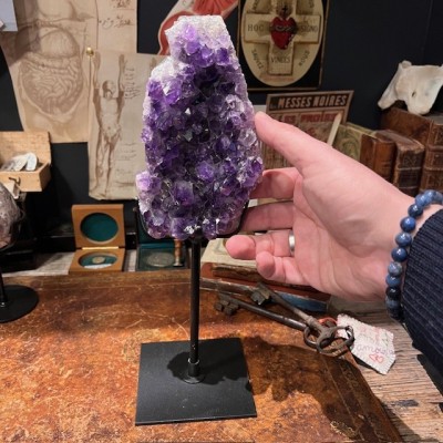 Amethyst fragment on a stand