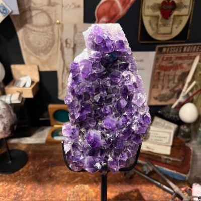 Amethyst fragment on a stand