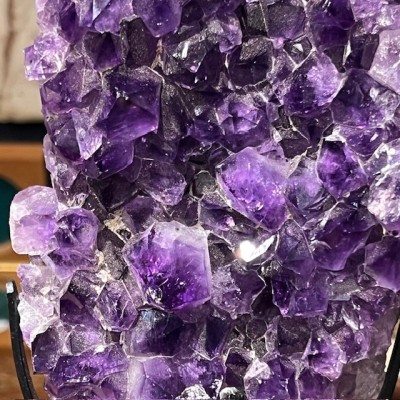 Amethyst fragment on a stand
