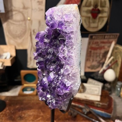 Amethyst fragment on a stand
