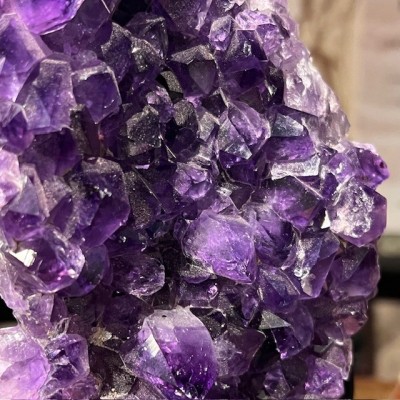 Amethyst fragment on a stand