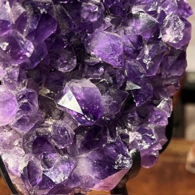 Amethyst fragment on a stand