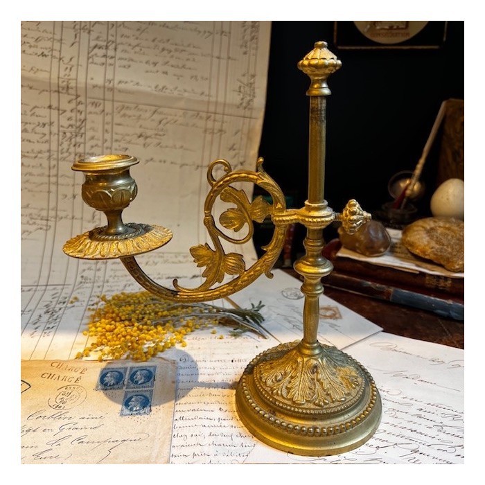 Antique brass candlestick or candle holder, adjustable height and swiveling