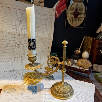 Antique brass candlestick or candle holder, adjustable height and swiveling