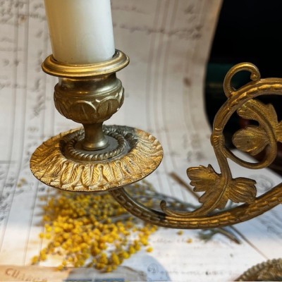 Antique brass candlestick or candle holder, adjustable height and swiveling