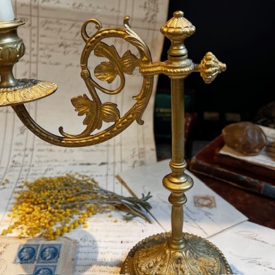 Antique brass candlestick or candle holder, adjustable height and swiveling