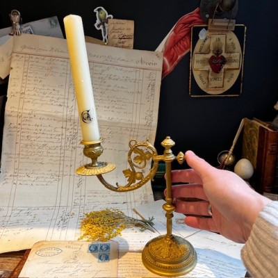 Antique brass candlestick or candle holder, adjustable height and swiveling