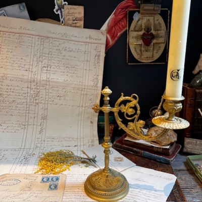 Antique brass candlestick or candle holder, adjustable height and swiveling