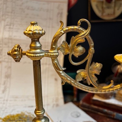 Antique brass candlestick or candle holder, adjustable height and swiveling