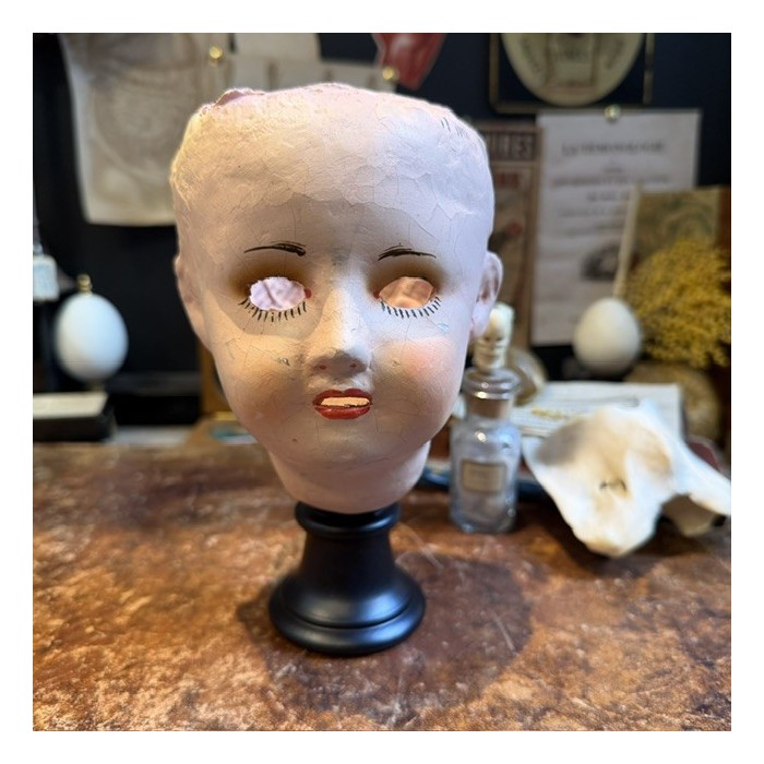 Antique papier-mâché doll’s head on a wooden base - Ref A