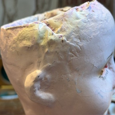 Antique papier-mâché doll’s head on a wooden base - Ref A