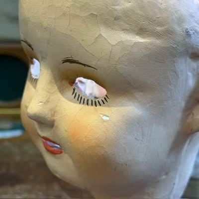 Antique papier-mâché doll’s head on a wooden base - Ref A