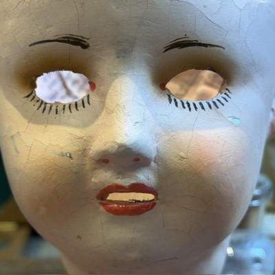 Antique papier-mâché doll’s head on a wooden base - Ref A