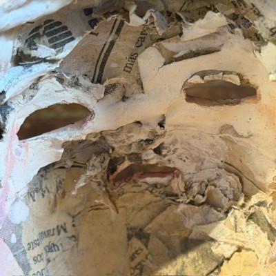 Antique papier-mâché doll’s head on a wooden base - Ref A