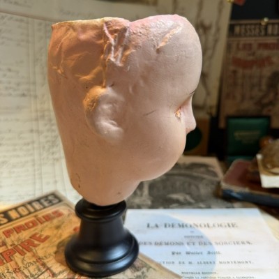 Antique papier-mâché doll’s head on a wooden base - Ref A