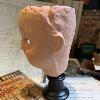 Antique papier-mâché doll’s head on a wooden base - Ref A
