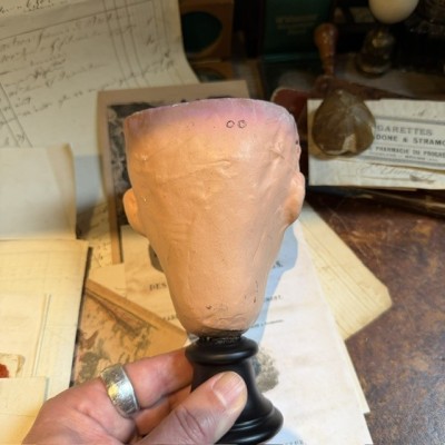 Antique papier-mâché doll’s head on a wooden base - Ref A