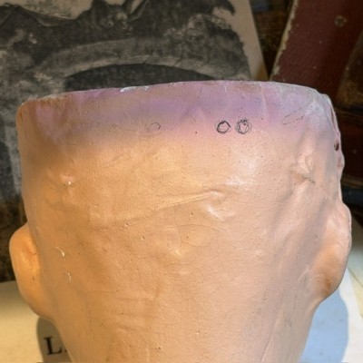 Antique papier-mâché doll’s head on a wooden base - Ref A
