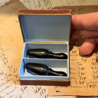 Pair of ebonite medical cannulas in their original box - 1920/1930