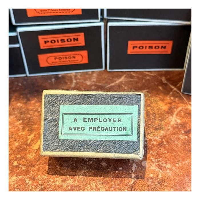 To be used with care - Antique labels in a pharmacy box for remedy in canvas cardboard
