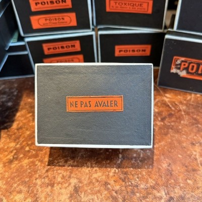 Do not swallow - Antique labels in a pharmacy box for remedy in canvas cardboard