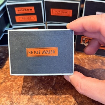 Do not swallow - Antique labels in a pharmacy box for remedy in canvas cardboard