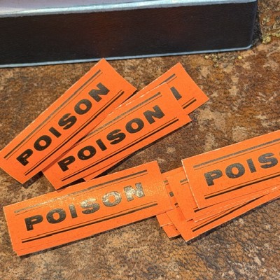 POISON - Antique labels in a pharmacy box for remedy in canvas cardboard