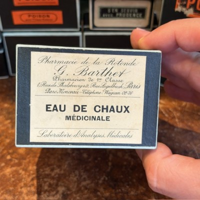 Eau de Chaux Médicinale - Antique labels in a pharmacy box for remedy in canvas cardboard