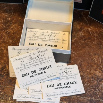 Eau de Chaux Médicinale - Antique labels in a pharmacy box for remedy in canvas cardboard