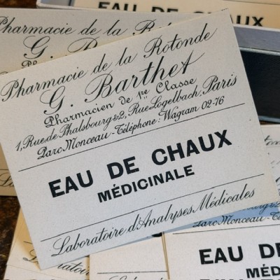 Eau de Chaux Médicinale - Antique labels in a pharmacy box for remedy in canvas cardboard