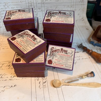 Eau de Chaux Médicinale - Antique labels in a pharmacy box for remedy in canvas cardboard